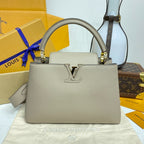 Louis Vuitton Capucines Handbag Medium