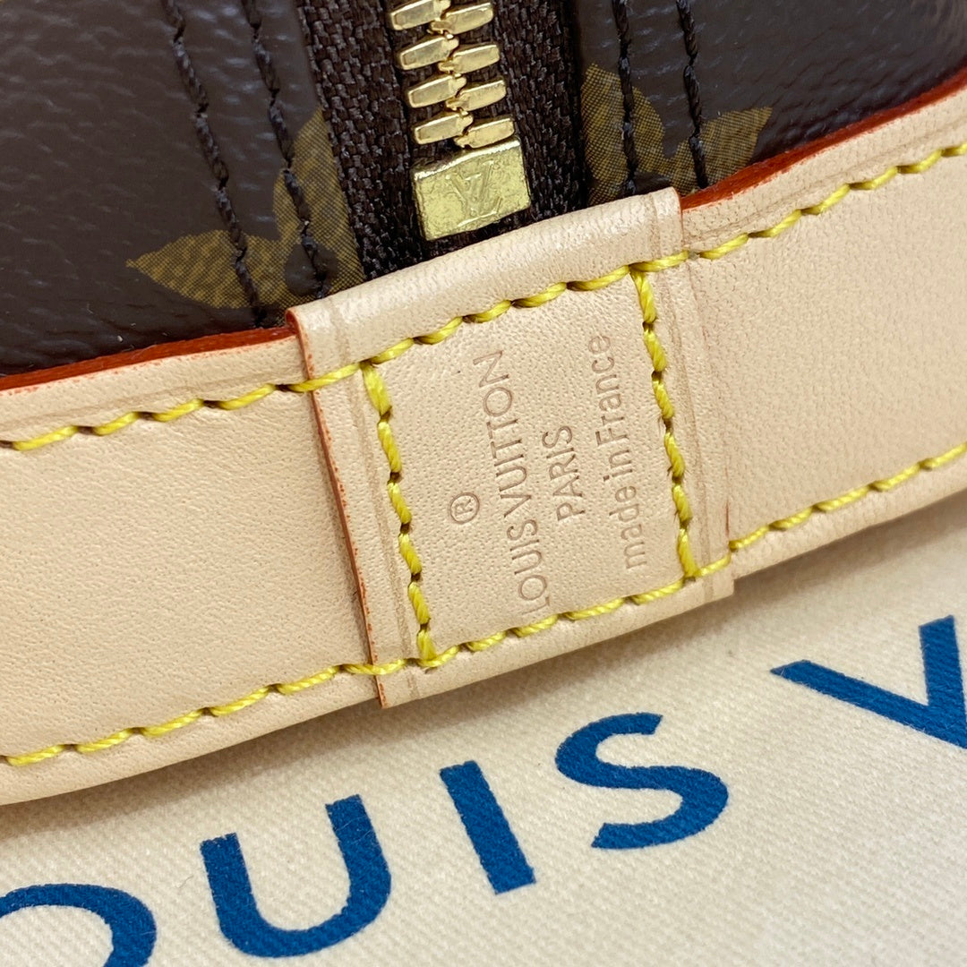 Louis Vuitton Alma Shell Handbag