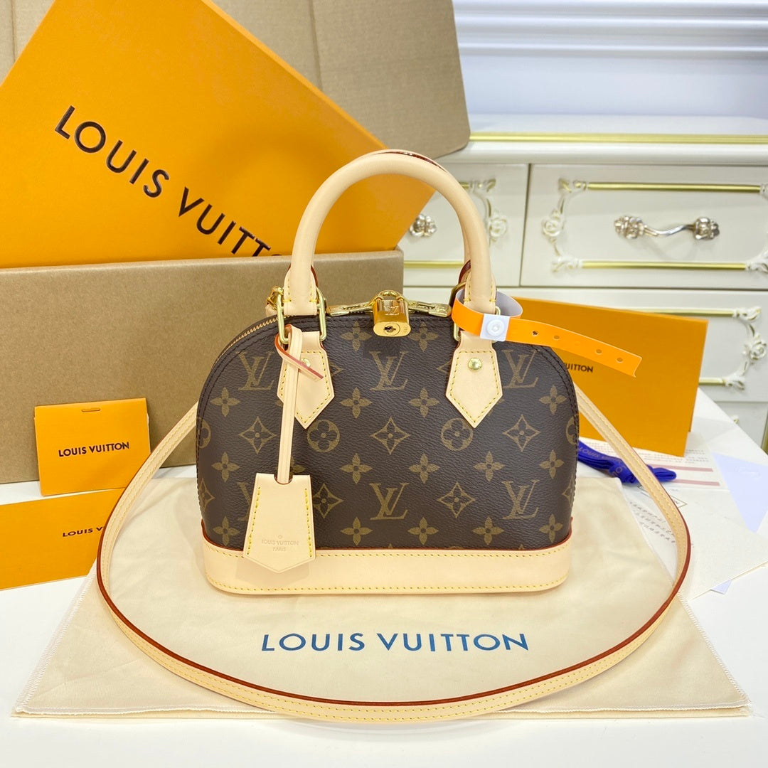 Louis Vuitton Alma Shell Handbag