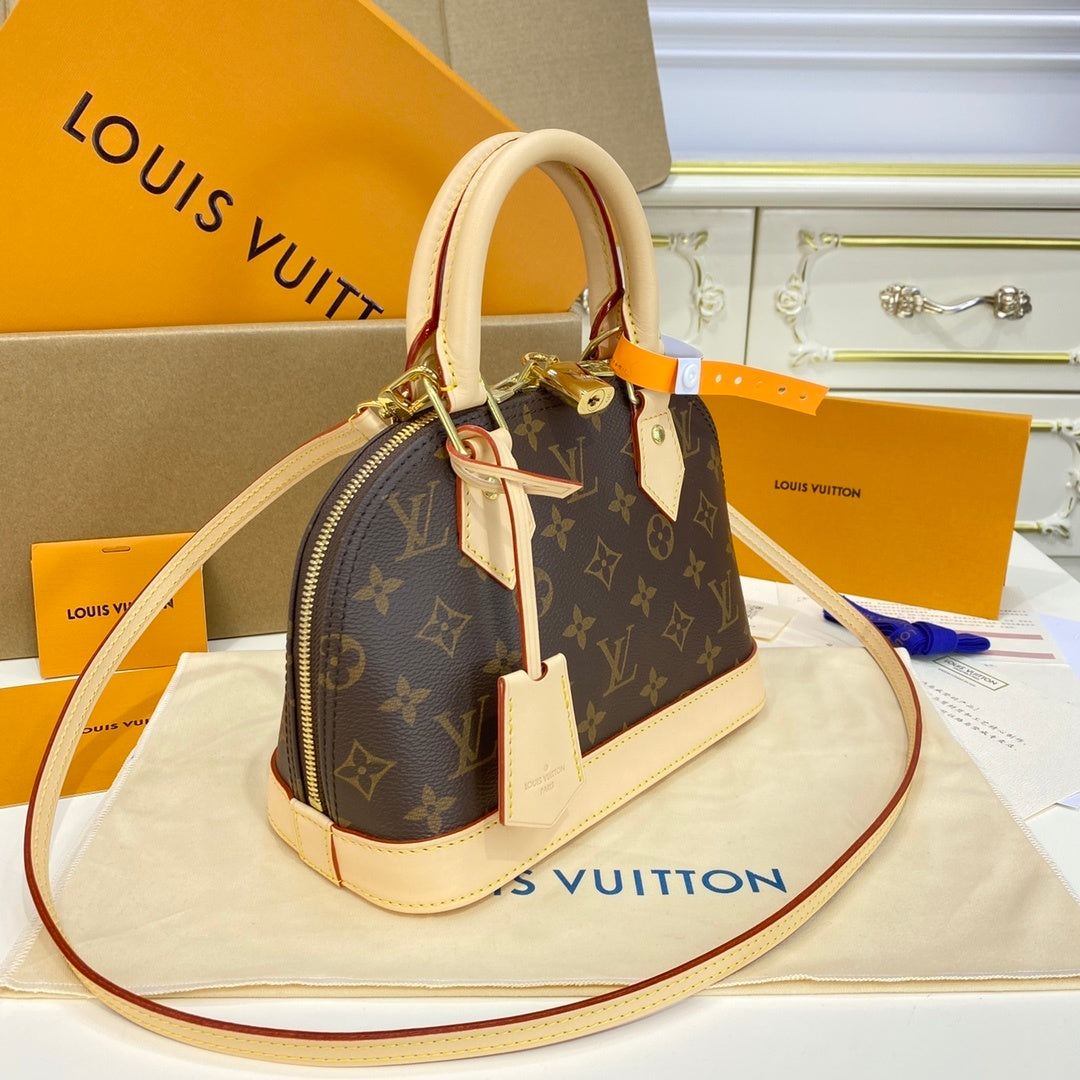 Louis Vuitton Alma Shell Handbag