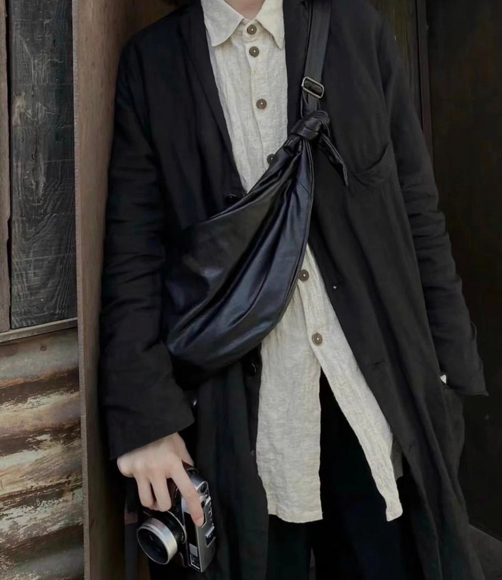 Discord Yohji Yamamoto Logo-Embossed Leather Crossbody Bag