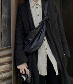 Discord Yohji Yamamoto Logo-Embossed Leather Crossbody Bag